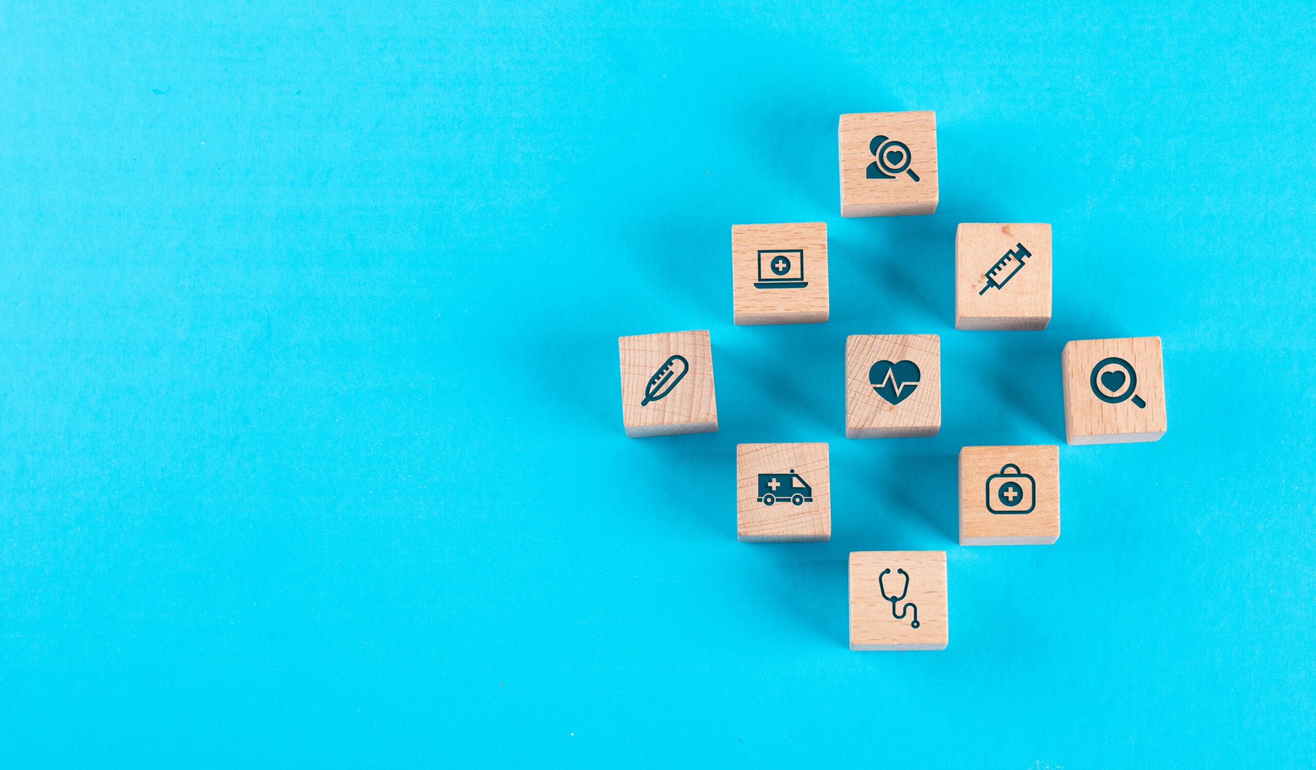 Wooden blocks with healthcare icons